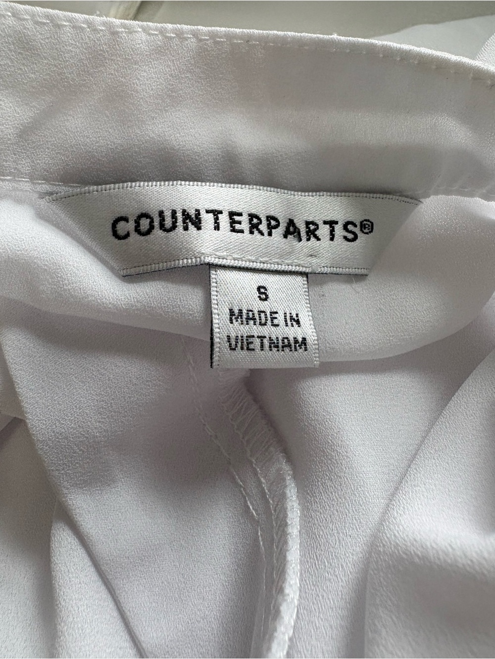 Counterparts White V-Neck Peplum Tunic - Picture 3 of 6